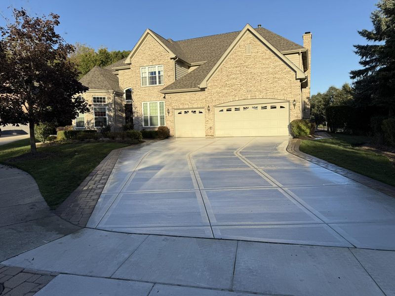 Finished concrete driveway in Naperville with broom finish